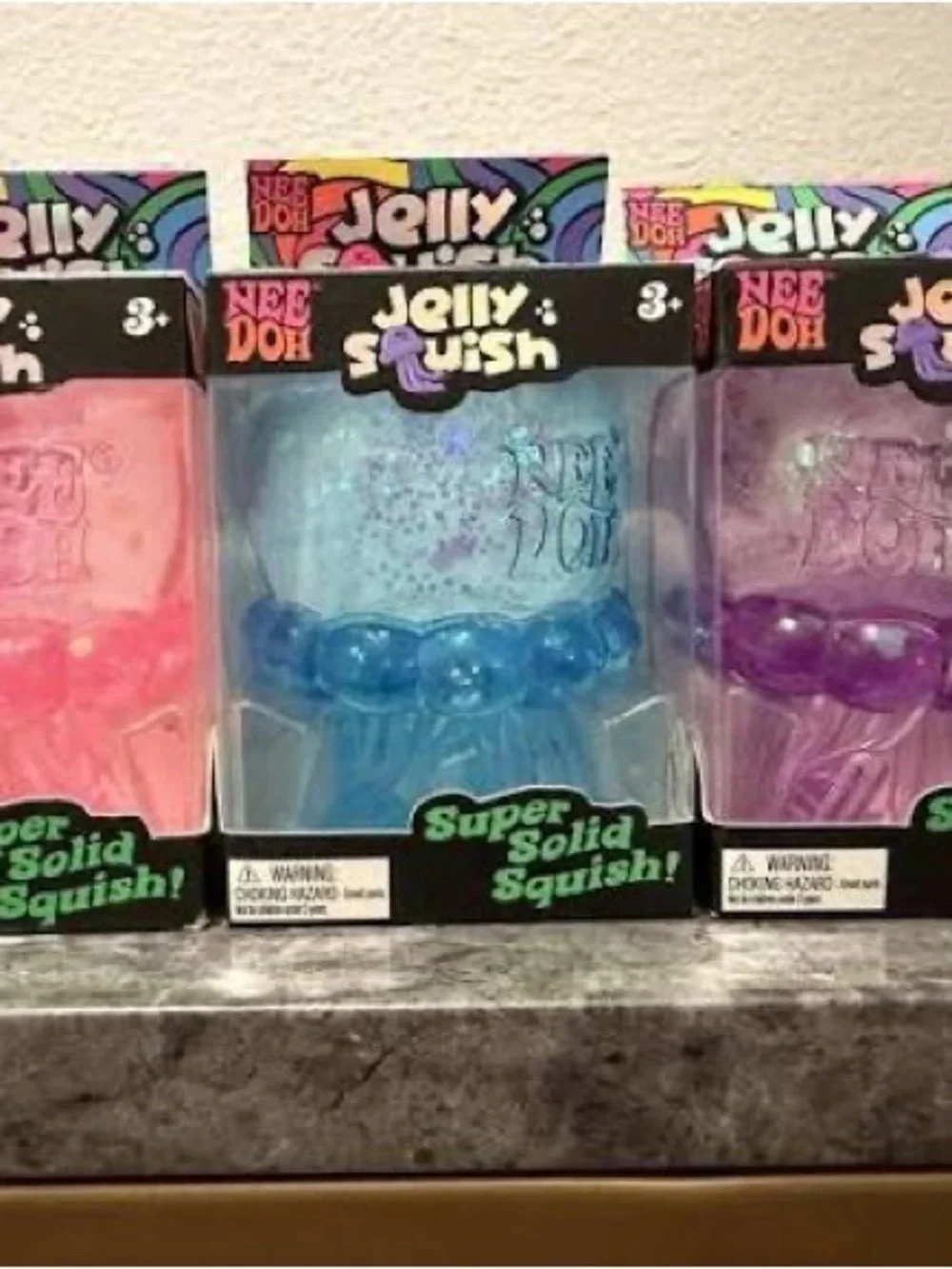 Nee Doh Jelly Squish Super Solid Squish - Pink Glitter